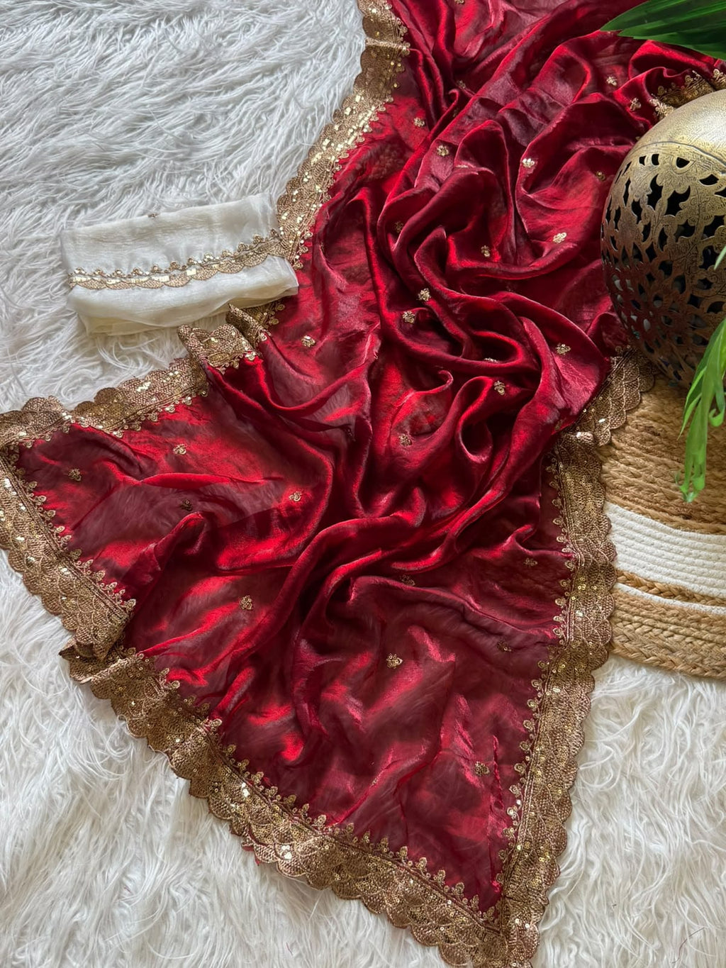 Red bordered silk saree with contrast blouse