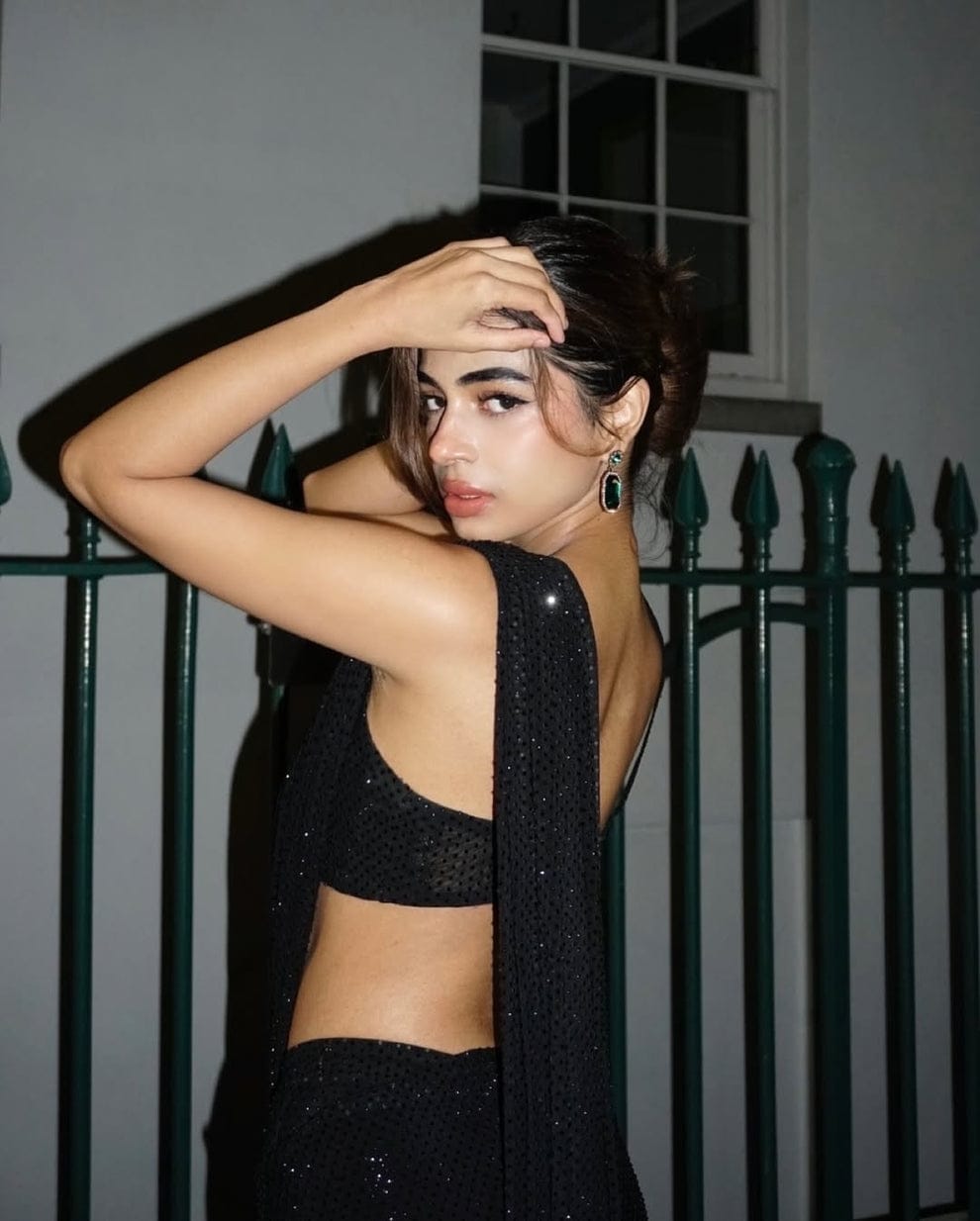 Black sequence saree with corset blouse