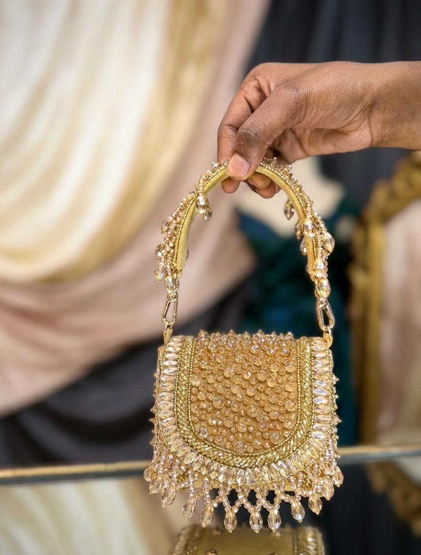 Golden dangling beaded purse