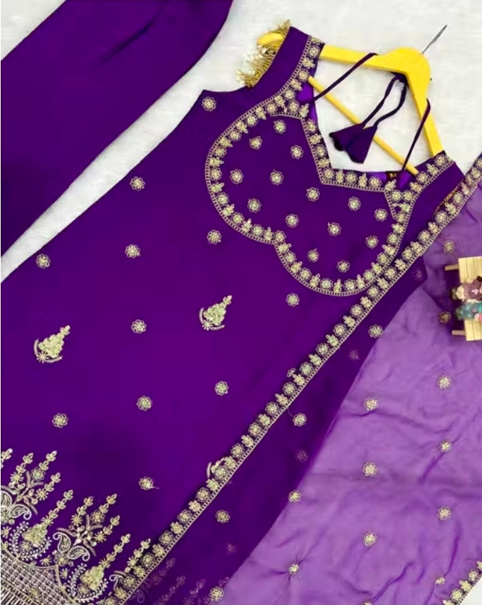 Purple sleeveless suit with pent and dupatta