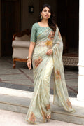 Green printed saree with blouse
