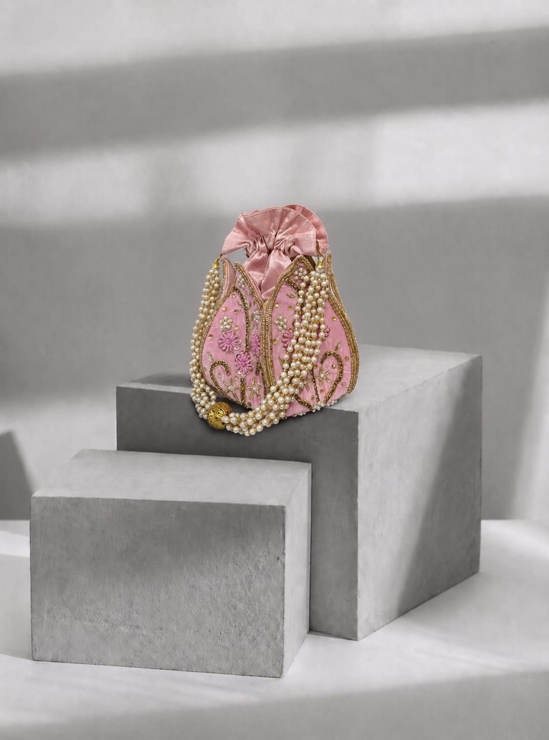 Pink moti work indian potli bag