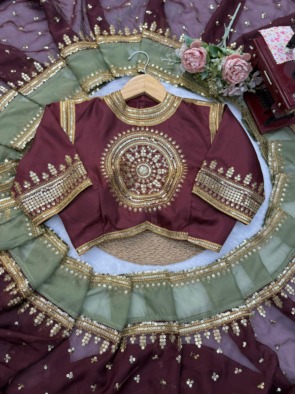 Maroon silk saree with high neck blouse
