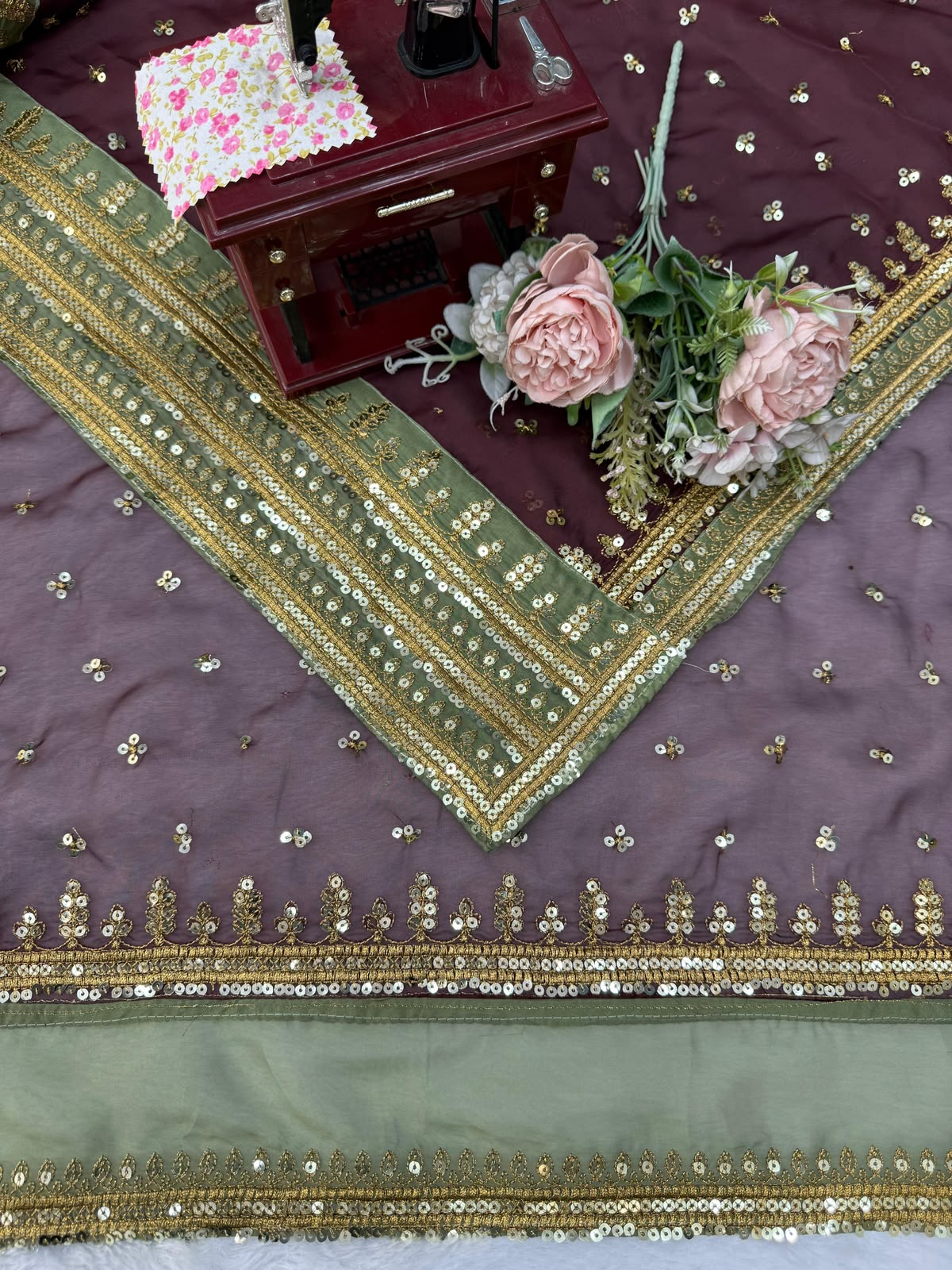Maroon silk saree with high neck blouse