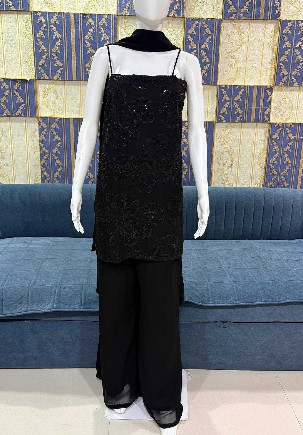 Black sleeveless kurti with palazzo and dupatta set