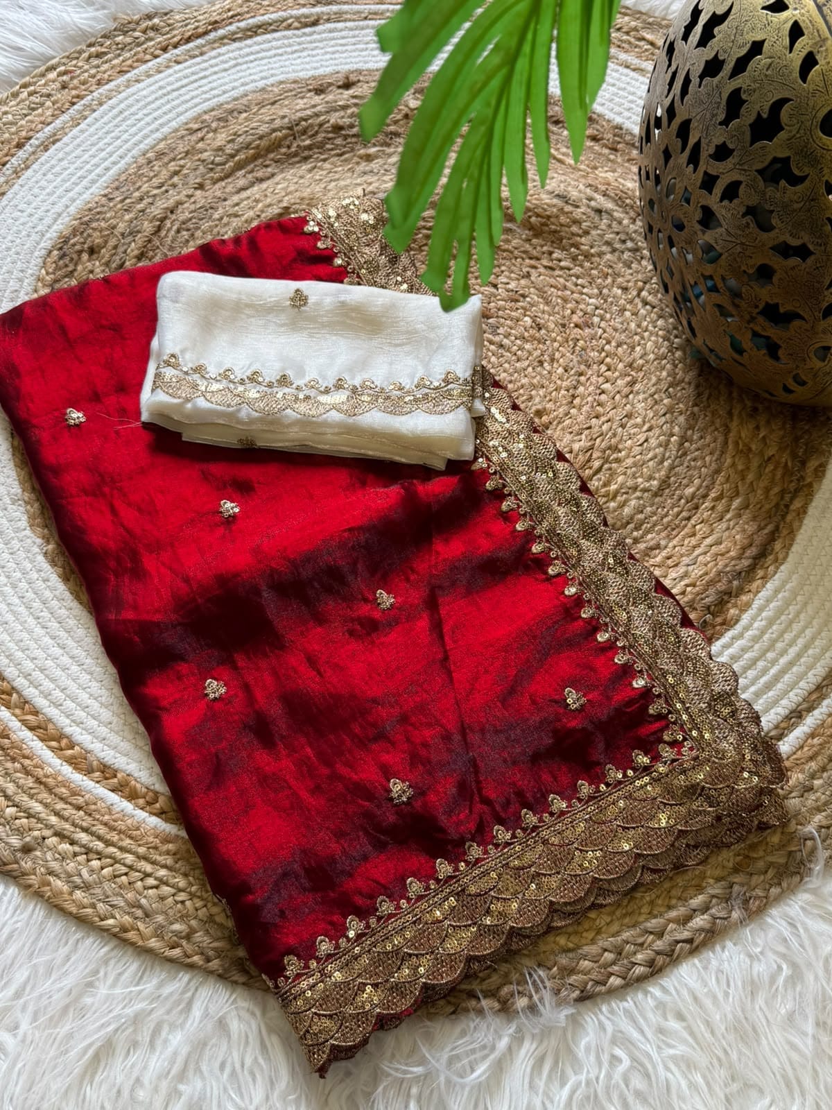 Red bordered silk saree with contrast blouse