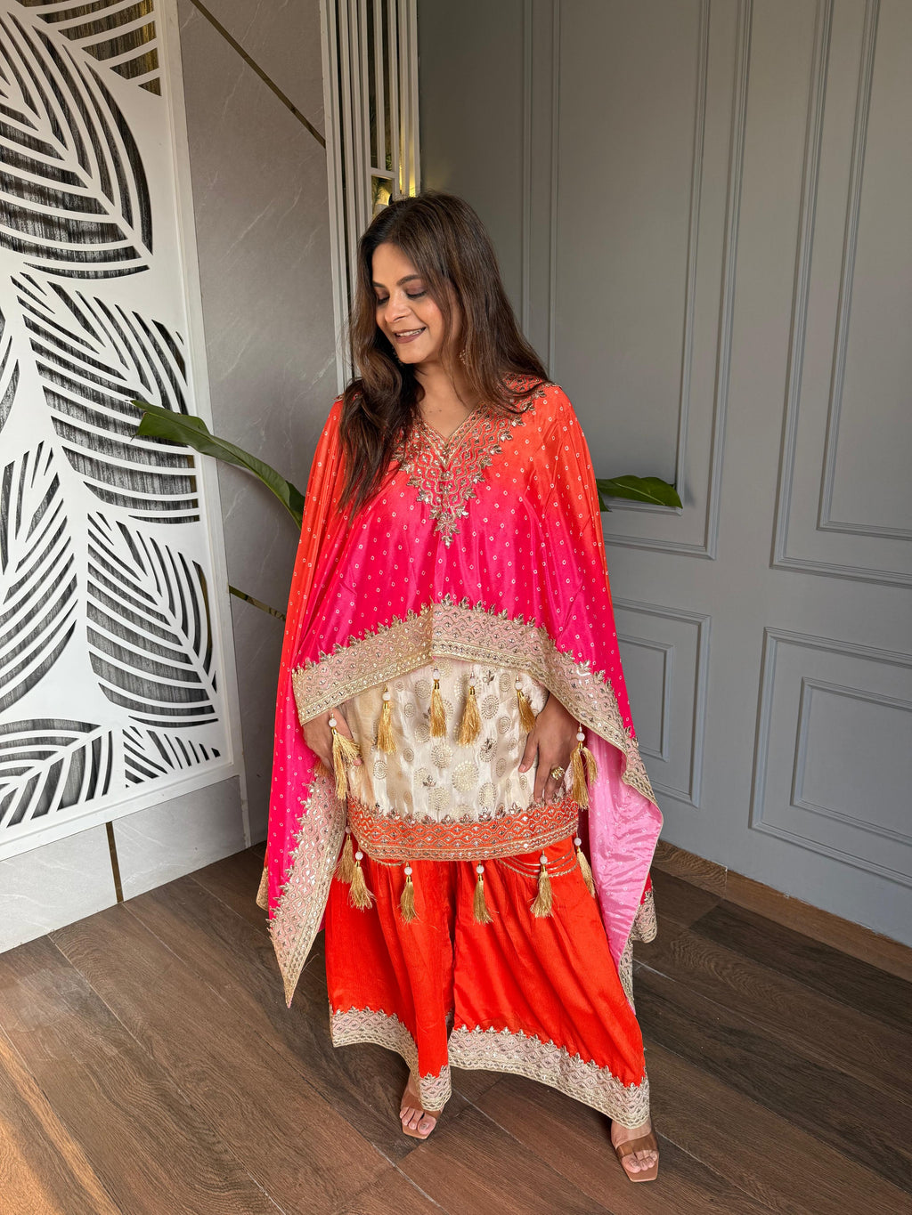 Orange kaftan with kurti and sharara set