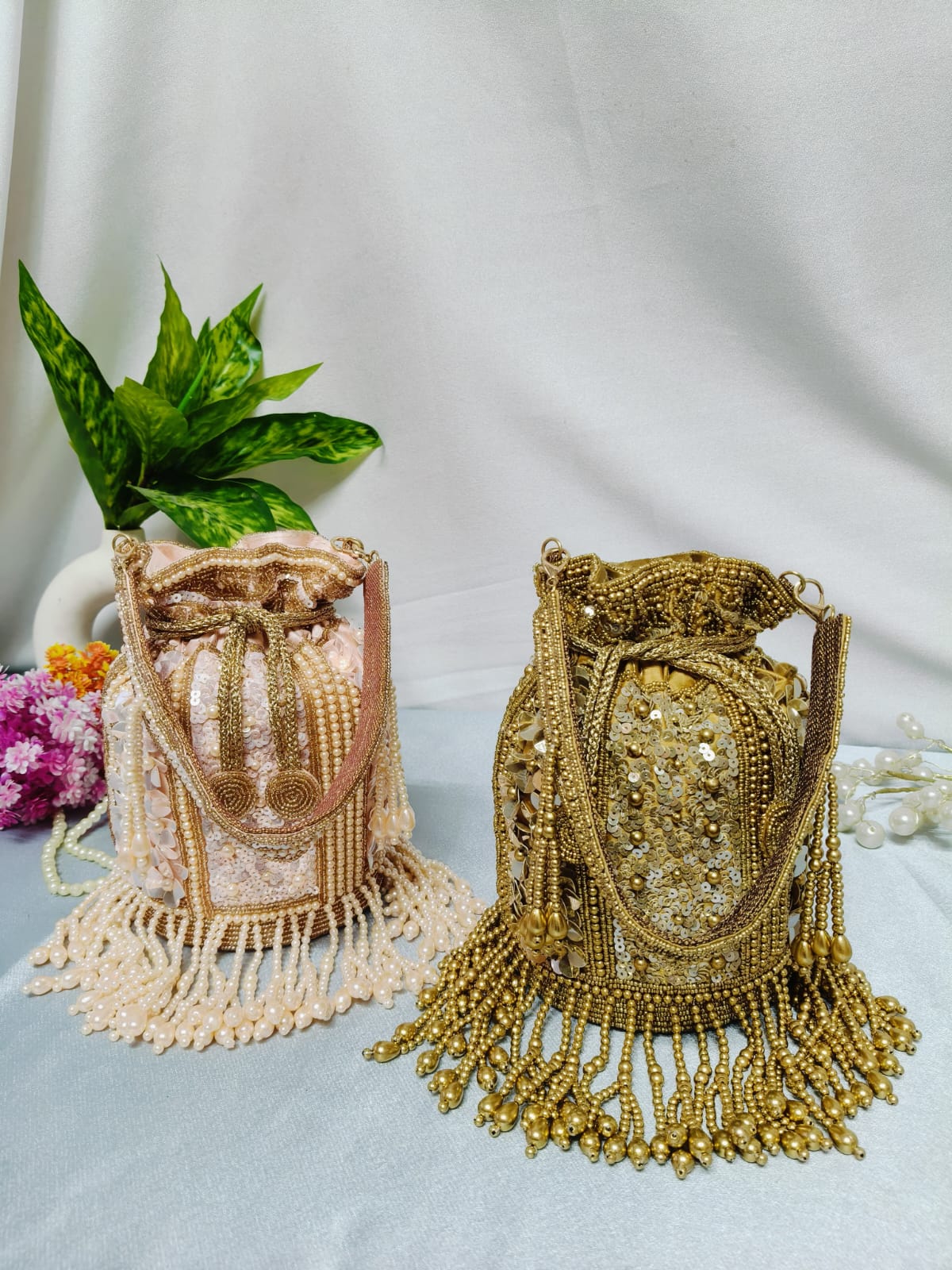 Golden dangling latkan potli bag