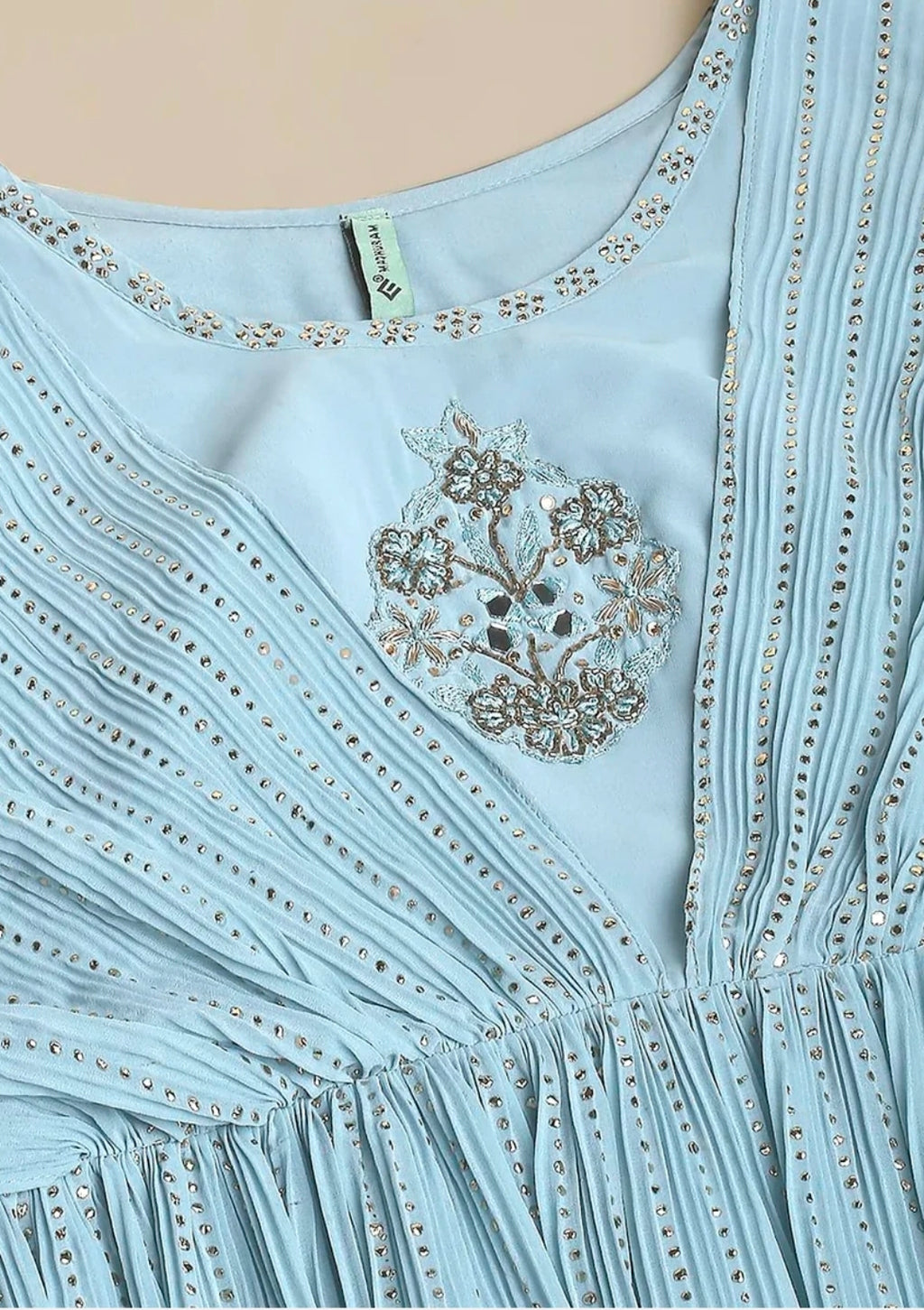 Ice blue off shoulder gown with belt