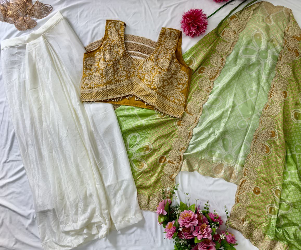 Yellow dhoti skirt with bandhani shrug and top set