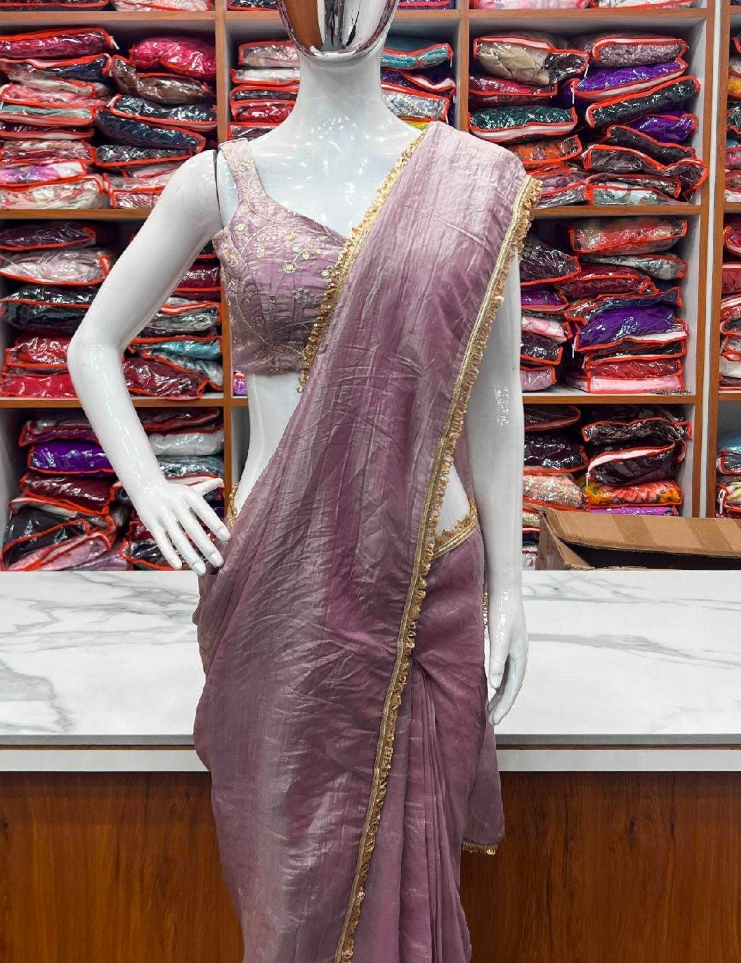 Purple silk lacey saree with blouse