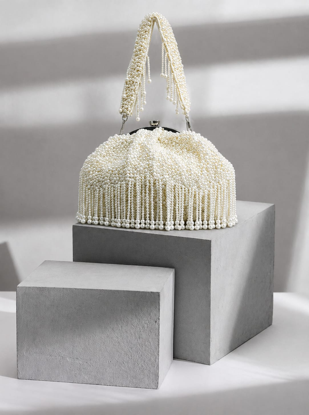 White pearl dangling purse