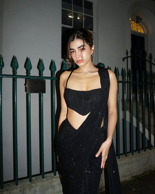 Black sequence saree with corset blouse