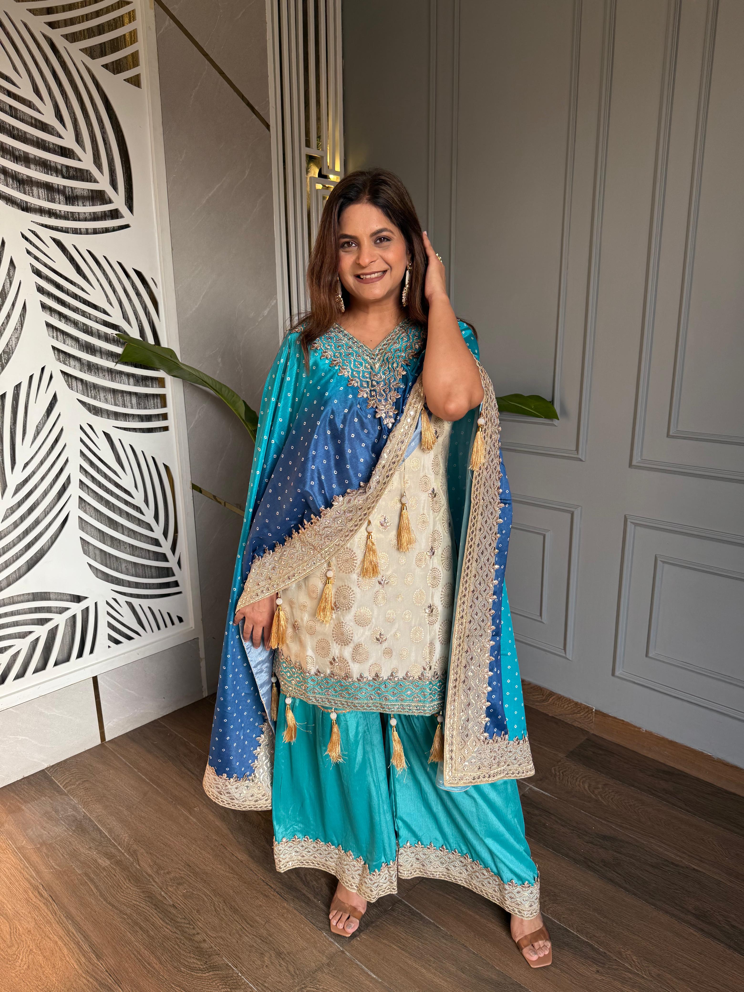Orange kaftan with kurti and sharara set