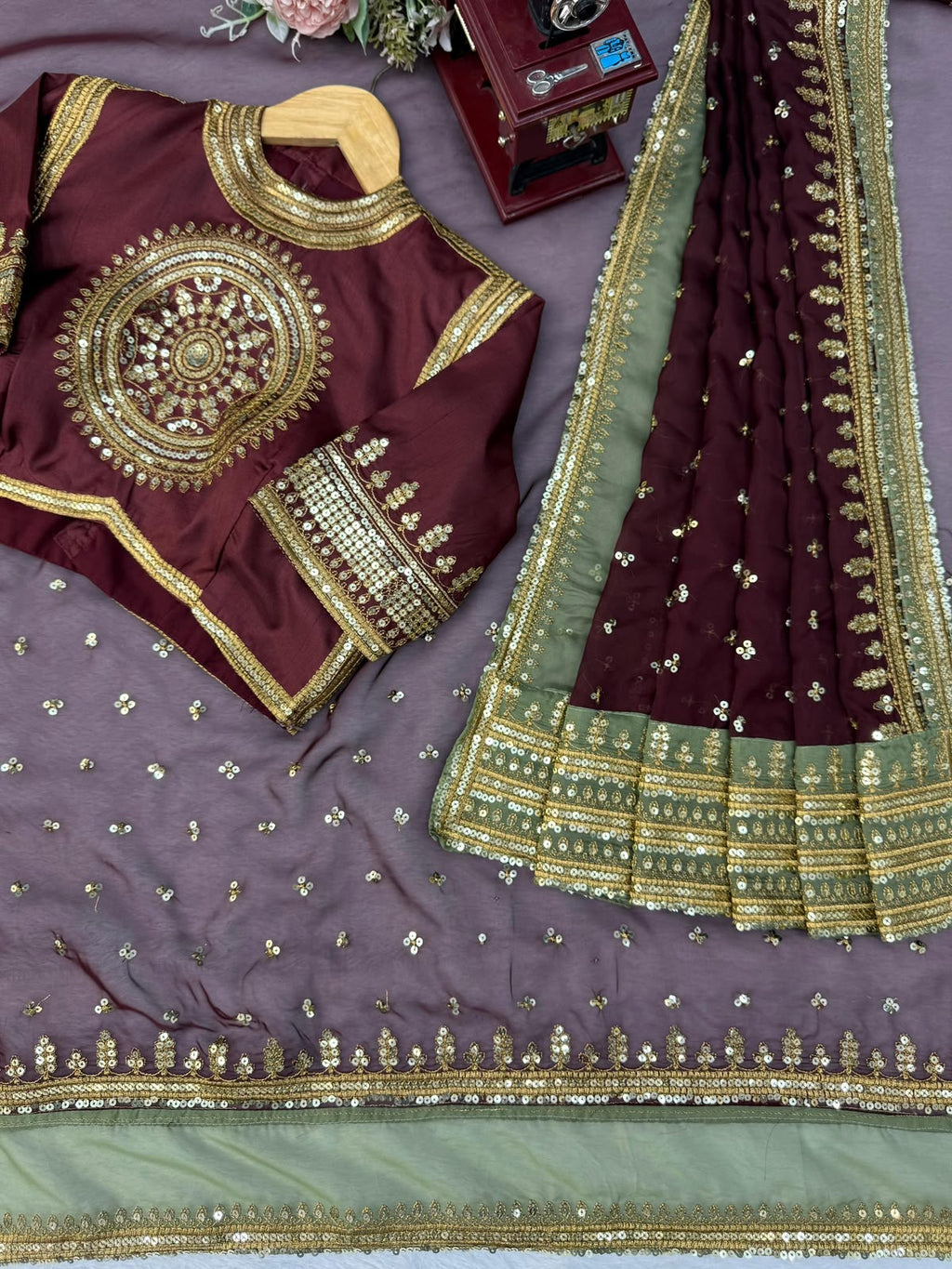 Maroon silk saree with high neck blouse